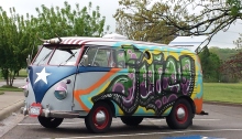 a Volkswagon beetle bus painted in crazy colours